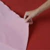 Additional Image 2 - a hand holding a piece of paper